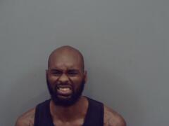 Mugshot of Moore, Sidney