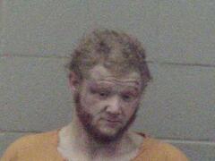 Mugshot of Russell, Chad